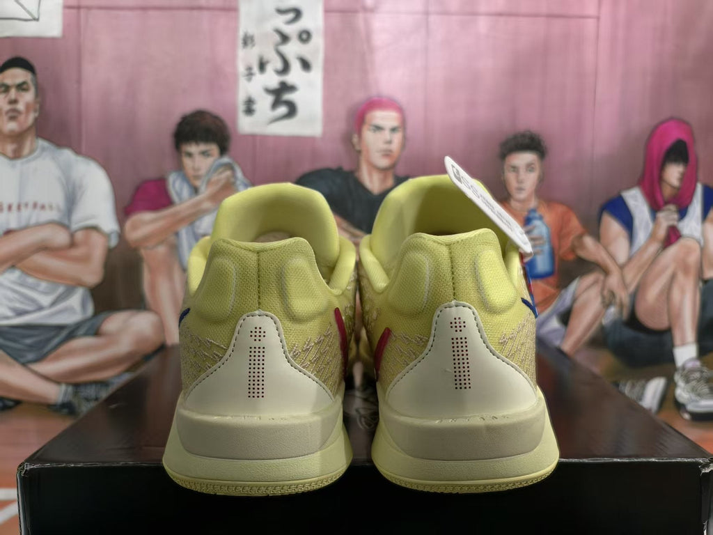 Nike Yellow Basketball Sneakers with Navy and Red Accents