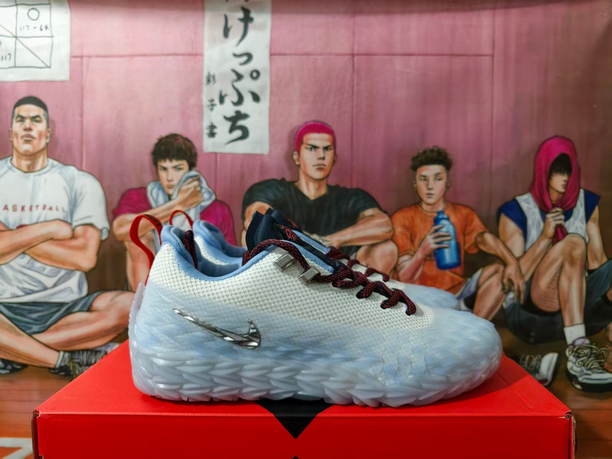 Nike White and Blue Basketball Sneakers with Red Accents