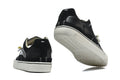 Black Low-Top Sneakers with Contrast Laces and White Sole