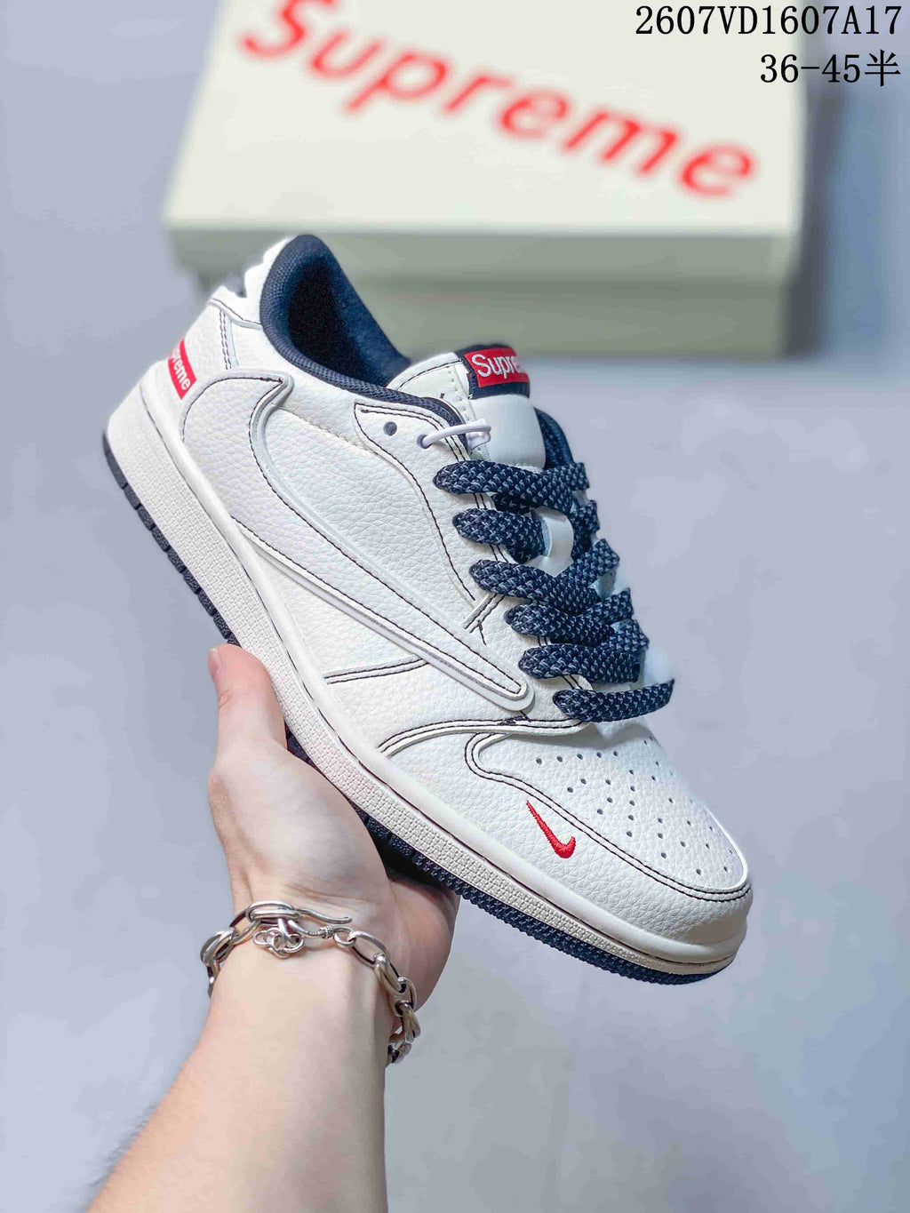 Jordan 1 Low White and Navy Sneakers