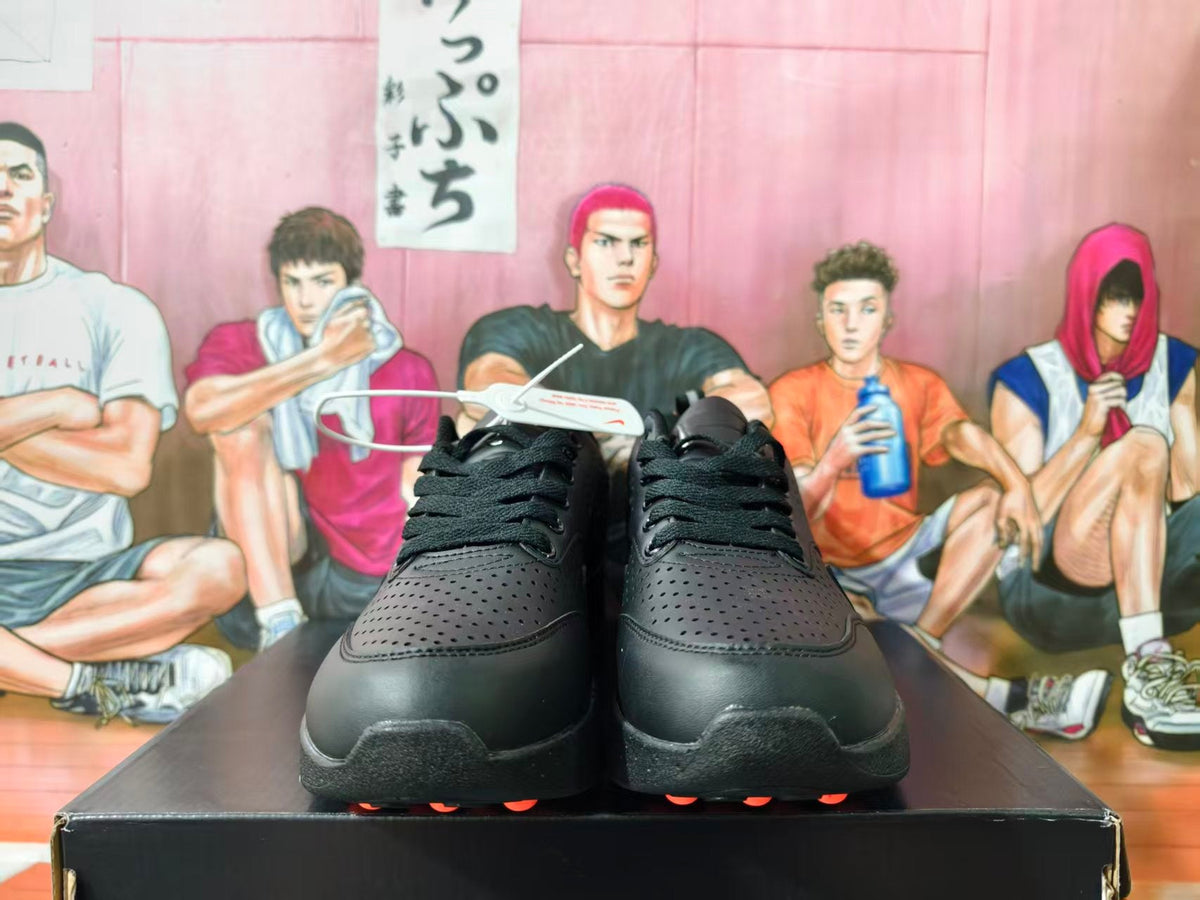 Nike Black Low-Top Sneakers with Metallic Swoosh