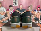 Nike Black and Green Basketball Shoes with Orange Accents
