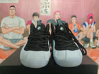 White and Black High-Top Basketball Sneakers