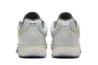 Nike Kyrie Low Basketball Shoes in Gray and Gold