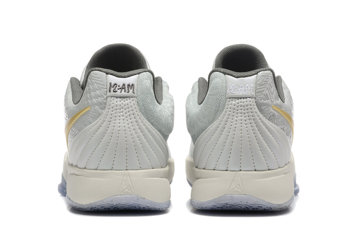 Nike Kyrie Low Basketball Shoes in Gray and Gold