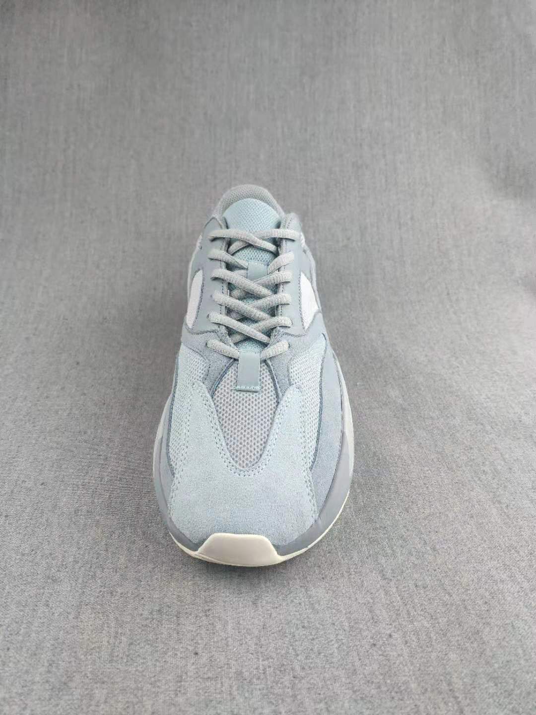 700 Gray and Coral Low-Top Sneakers