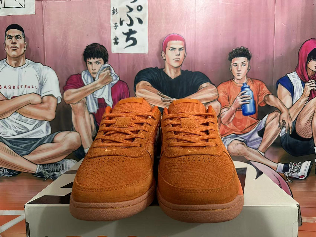 Nike Orange Low-Top Sneakers with Tan Swoosh