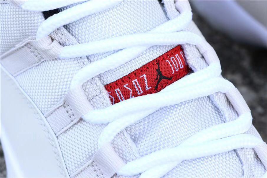 Jordan Air Jordan 11 Platinum Tint White Red Sneakers