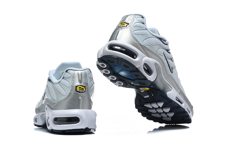 Nike Air Max Plus Sneakers in White and Metallic Silver