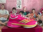 Pink Basketball Shoes with Metallic Gold Accents