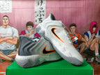 Nike Basketball Sneakers in Gray and White with Orange Swoosh