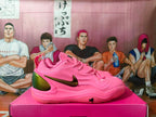 Nike Pink Basketball Sneakers with Metallic Gold Accents