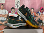 Nike Black and Green Basketball Shoes with Orange Accents
