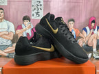 Nike Black and Gold Sneakers