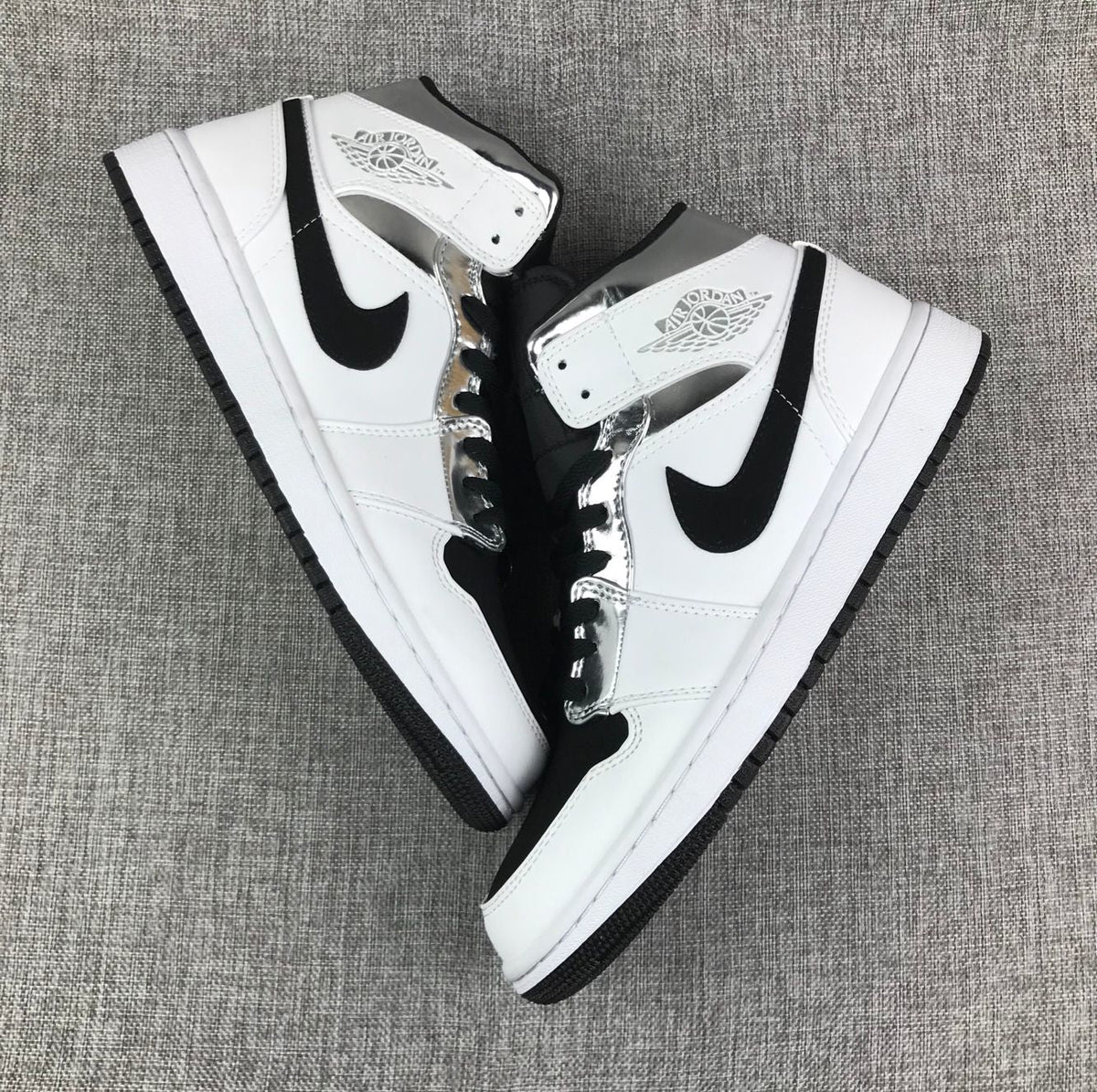 Jordan Air Jordan 1 Mid White Black Metallic Silver Sneakers