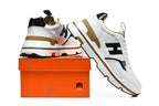 Hermès White and Black Low-Top Sneakers with Brown Trim