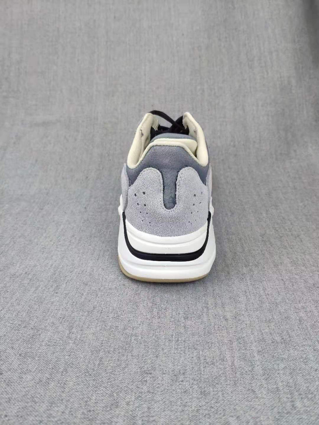 700 Grey Lifestyle Sneakers with Orange Accents