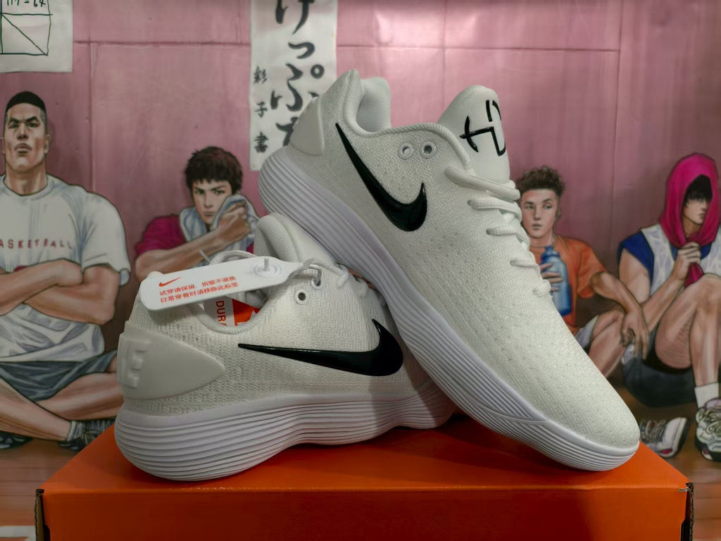 Nike White Basketball Sneakers with Black Swoosh