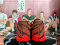 Nike Red Basketball Sneakers with Black and Orange Details
