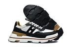 Hermès Black and White Low-Top Sneakers with Brown Trim
