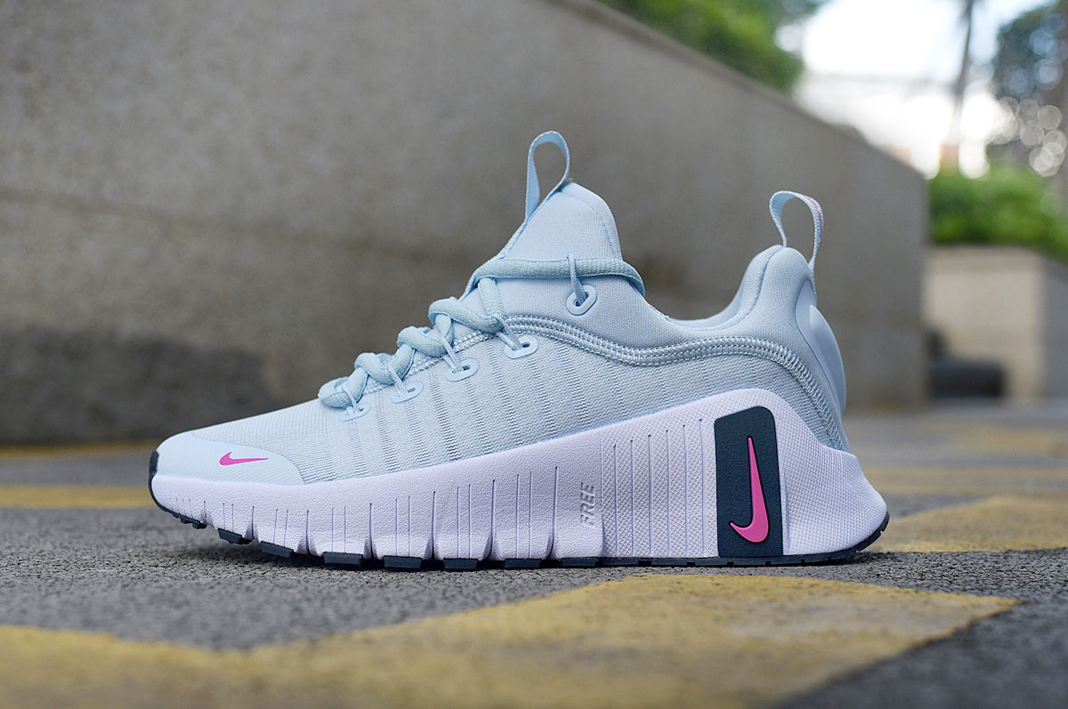 Nike Free Running Shoes in Light Blue and Pink