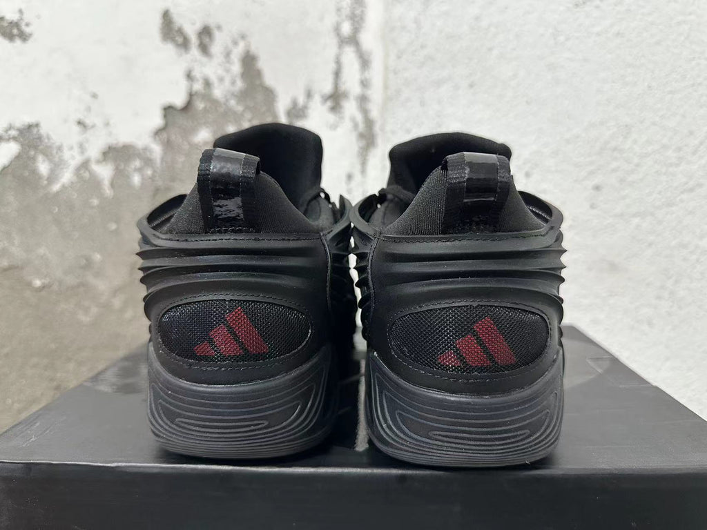 Adidas Black Sneakers with Sculpted Side Panels