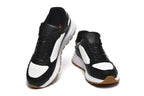 Prada Black and White Logo Low-Top Sneakers
