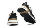 Hermès Black and White Low-Top Sneakers with Brown Trim