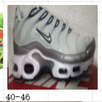 Nike Air Max Plus Sneakers in White and Metallic Silver