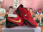 Nike Red and Black Basketball Sneakers with Gold Swoosh