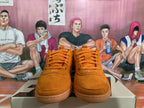 Nike Orange Low-Top Sneakers