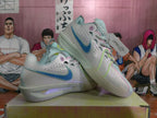 Nike White and Blue Low-Top Sneakers
