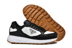 Prada Black and White Low-Top Sneakers with Gum Sole