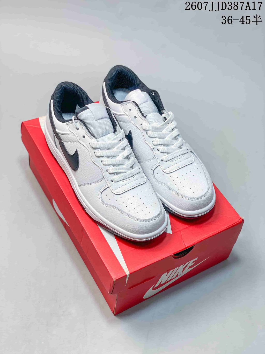 Nike Big Nike Low Sneakers in Black, Green, White and Navy
