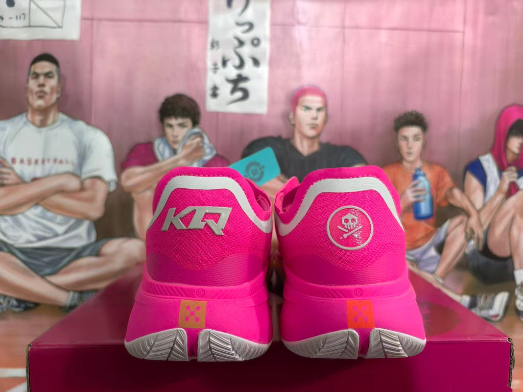 Pink Basketball Shoes with Metallic Gold Accents