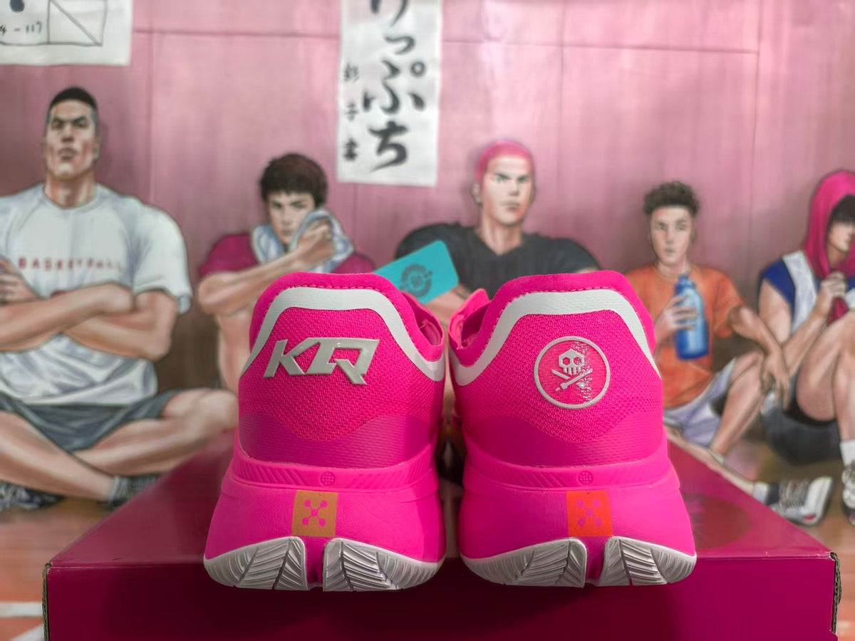 Pink Basketball Shoes with Metallic Gold Accents