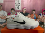 Nike White Basketball Sneakers with Black Swoosh