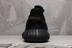 Yeezy 350 V2 Black Sneakers with Red Detail